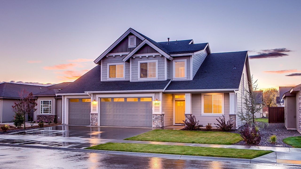 Suburban house with a newly constructed detached mother-in-law suite in the backyard.
