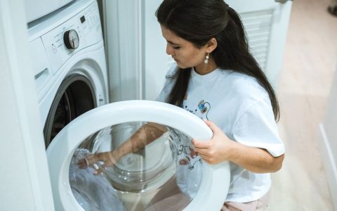 Open top load washing machine drum ready for laundry