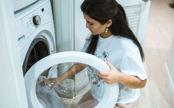Open top load washing machine drum ready for laundry