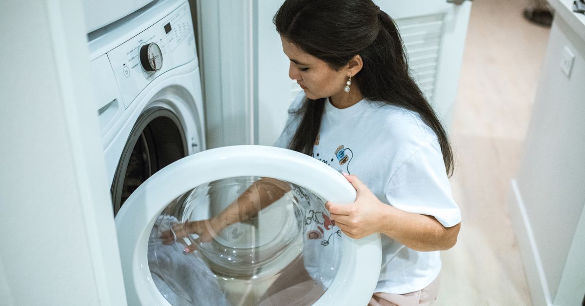 Open top load washing machine drum ready for laundry