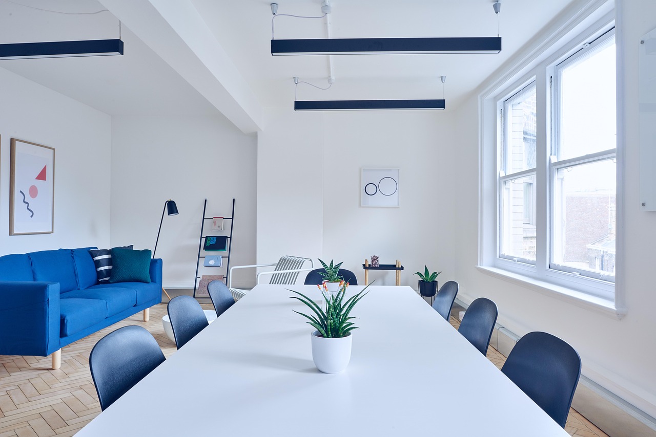 A polished wooden conference table arranged for a security audit and data privacy review.
