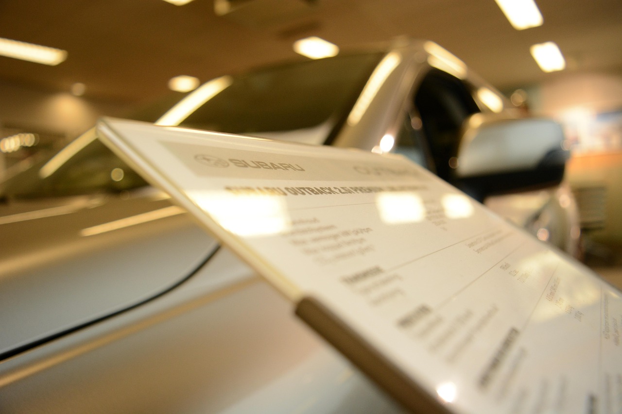 Car dealership lot filled with certified pre owned vehicles