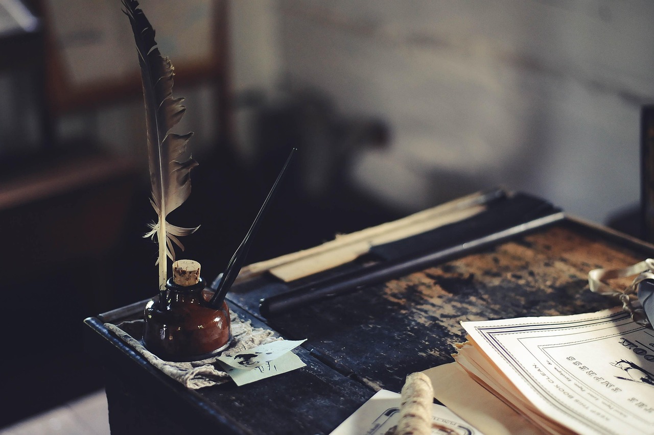 Close-up of high school academic documents on a guidance counselor desk.