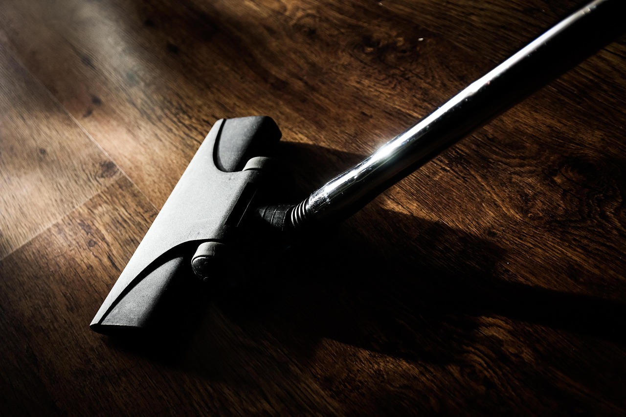 Eco-friendly liquid drain cleaner bottles on a kitchen counter