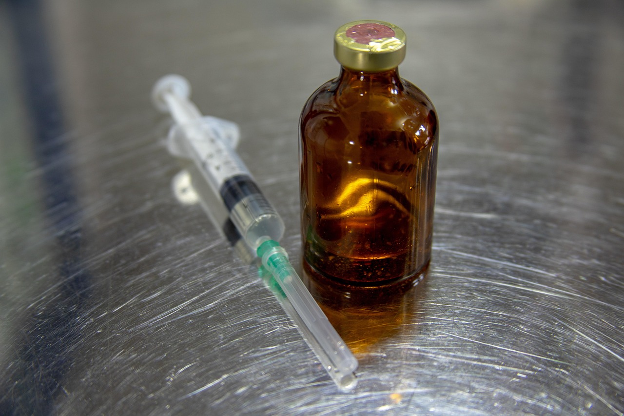 Veterinary supplies including a cobalamin vial, syringe, and prep pads arranged for home subcutaneous administration.