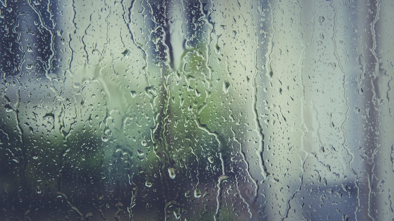 Fogged double pane residential window with condensation trapped between glass panes