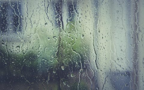 Fogged double pane residential window with condensation trapped between glass panes