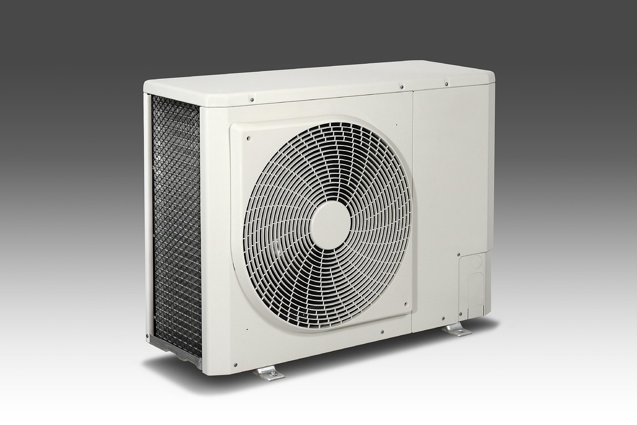 A modern installed high-efficiency dual-fuel gas furnace and central HVAC system.