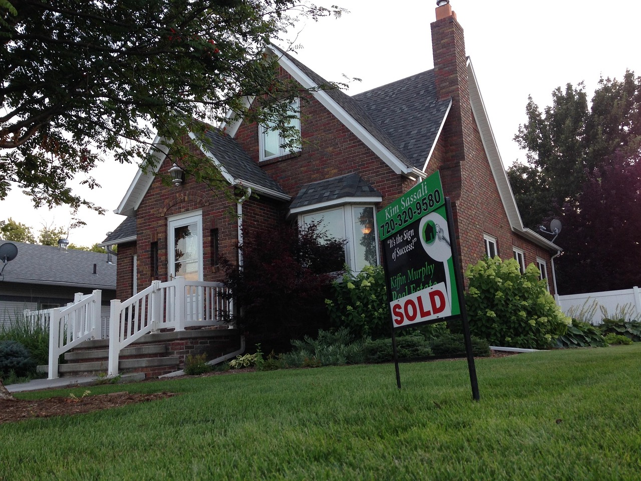 Suburban neighborhood single-family homes representing local municipal property taxes and public services.