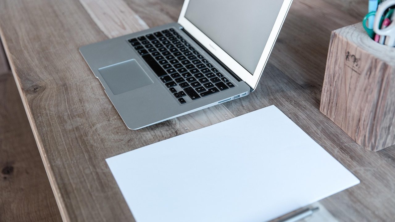 Professional reviewing workplace leave documentation at an office desk