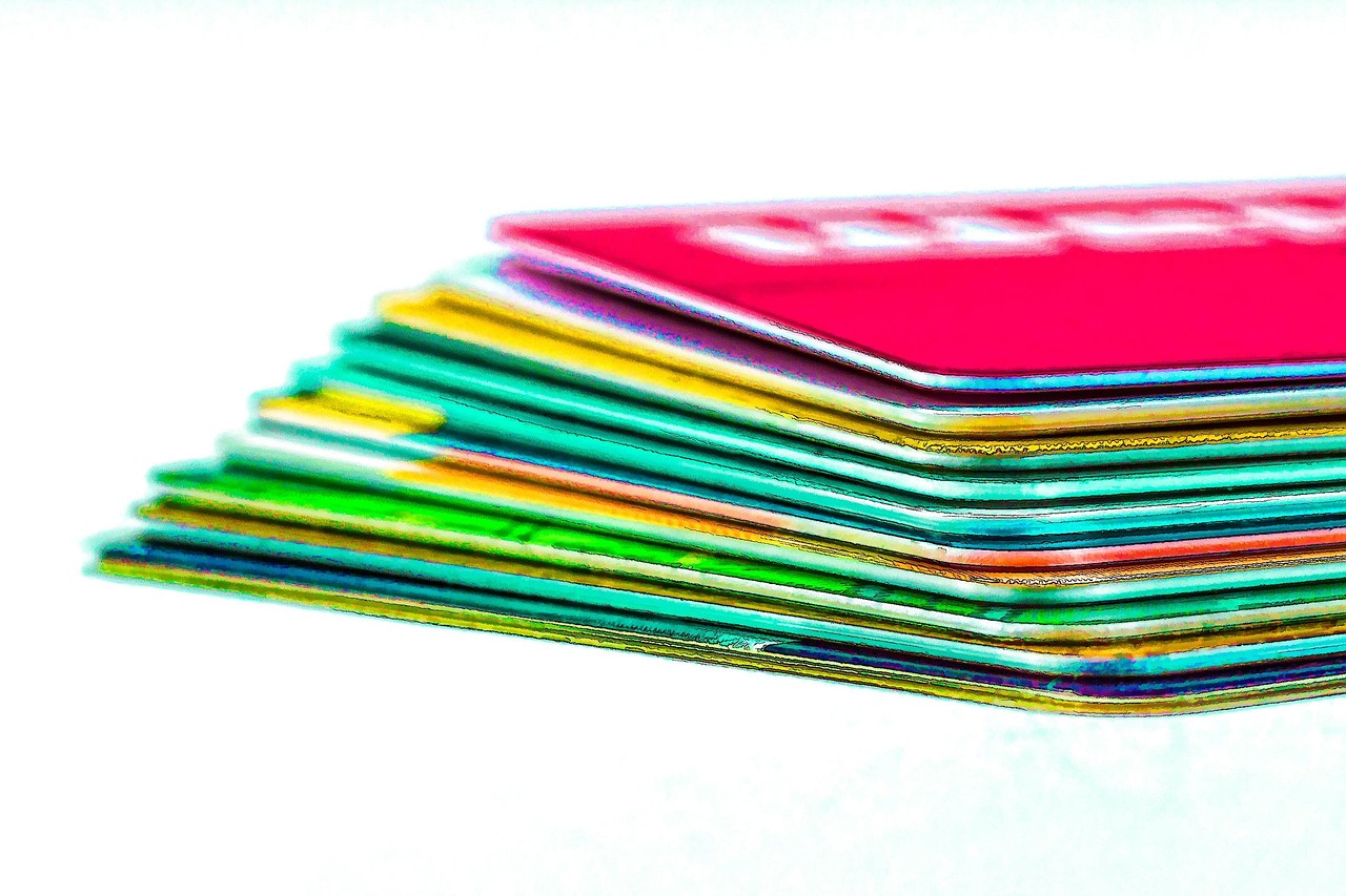 Close up of a credit card resting next to a kitchen counter.