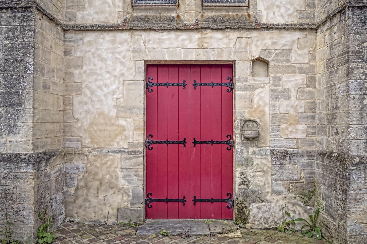 White wooden pocket door sliding smoothly inside a hallway wall