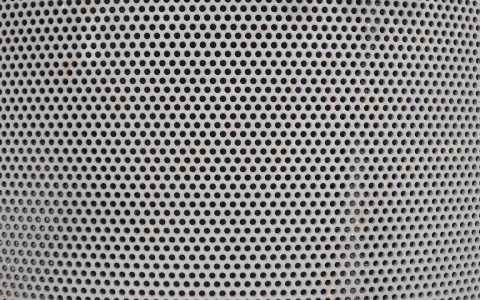 Applying liquid duct mastic sealant to sheet metal ductwork joints in a basement
