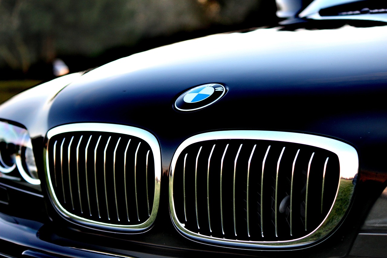 Close-up view of a car hood and fender seam showing uniform gap alignment.
