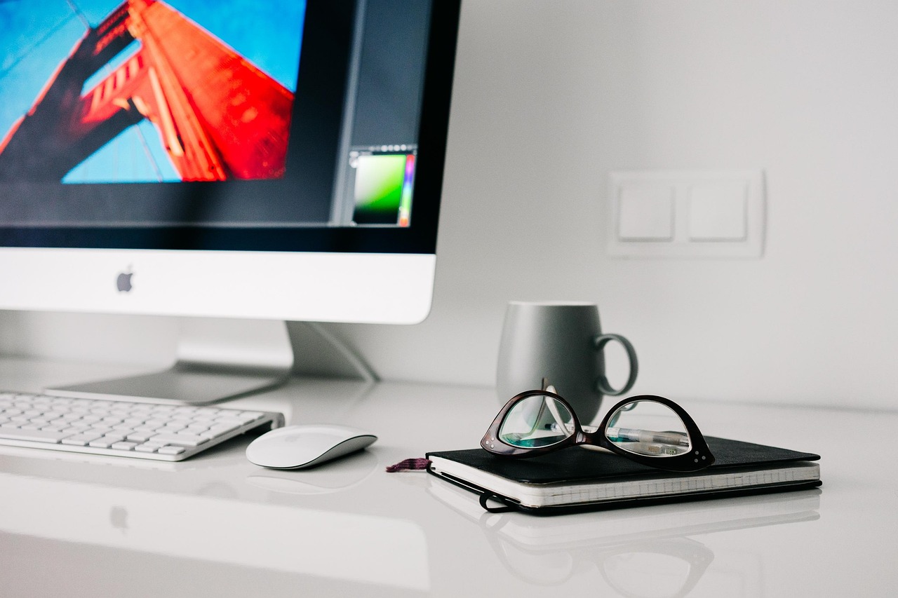 Professional working efficiently in a comfortable, well-lit modern home office workspace.