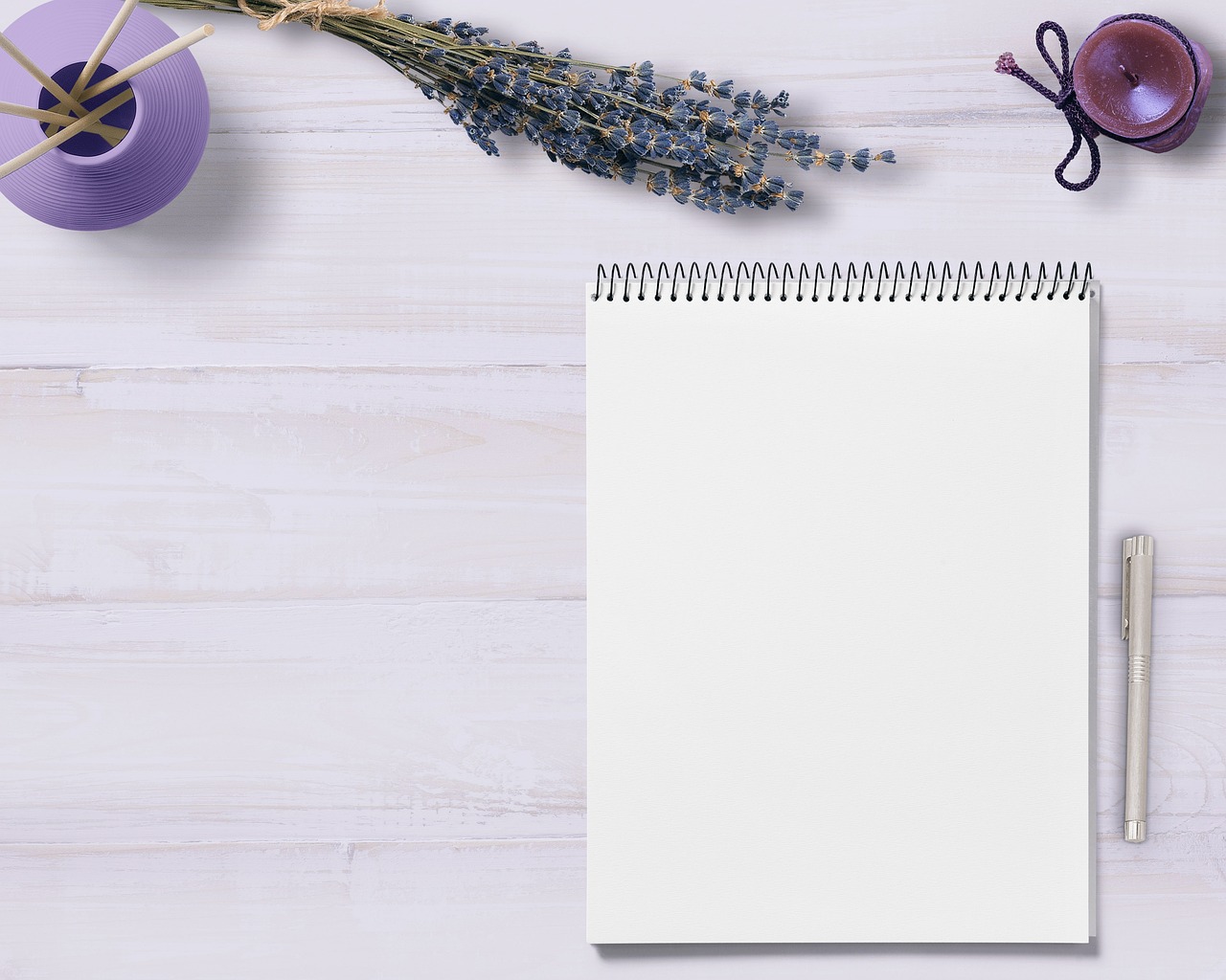 Close-up of a notepad featuring handwritten daily time logs and checkmarks.