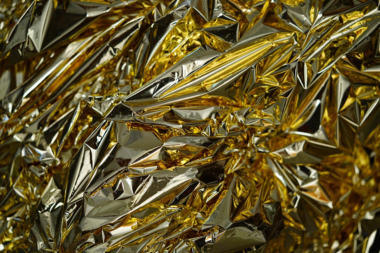 Rolled foil-faced radiant barrier insulation in a residential room