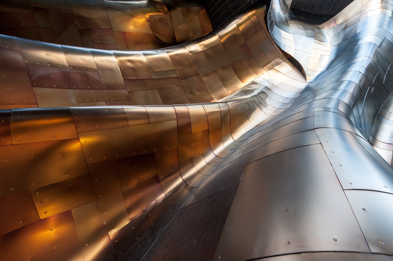 Detailed view of mineral scale buildup around copper boiler brass fittings and heating element flanges.