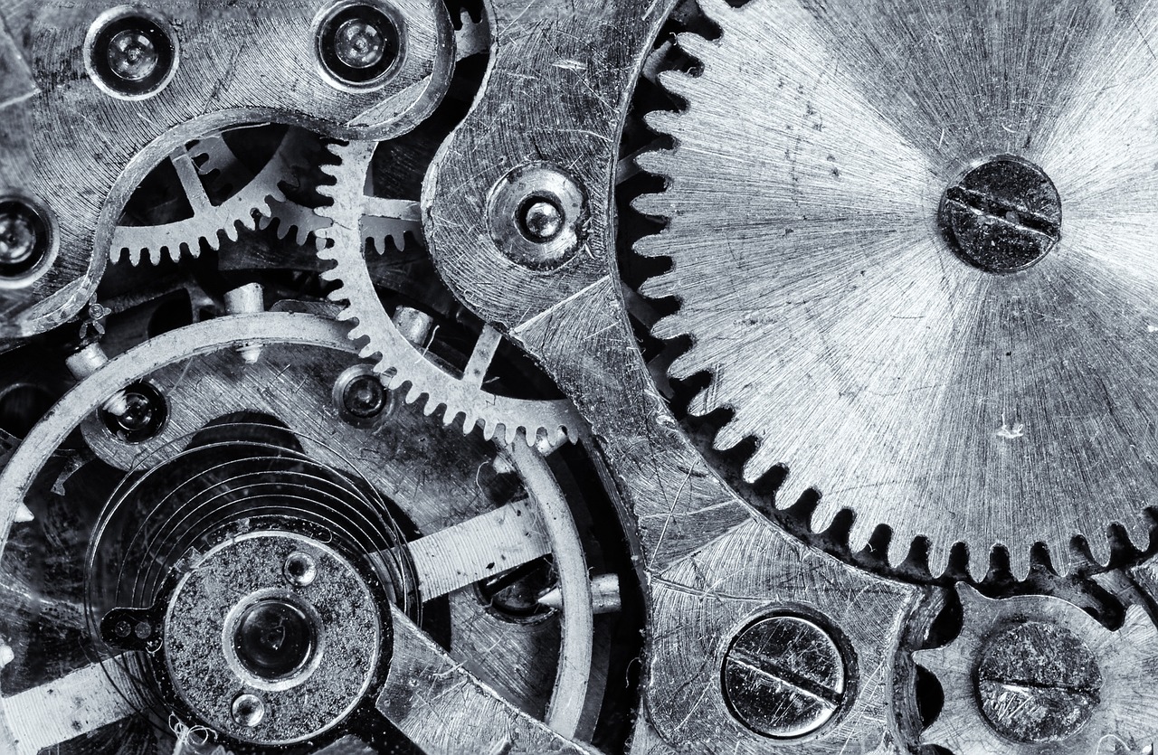 Close-up view of mechanical gear assembly inside a food slicer.