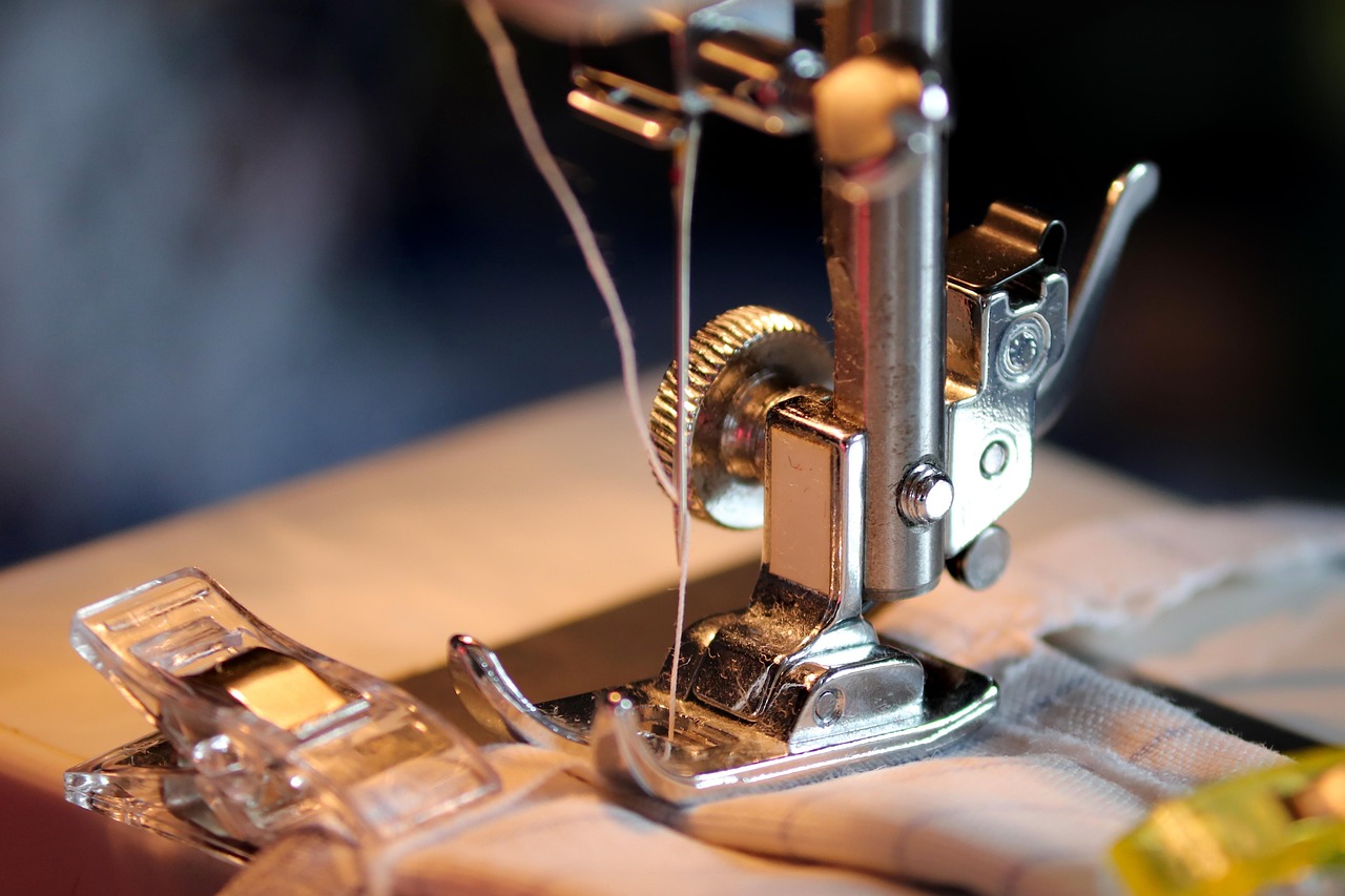 Industrial walking-foot sewing machine on a heavy-duty table with motor assembly
