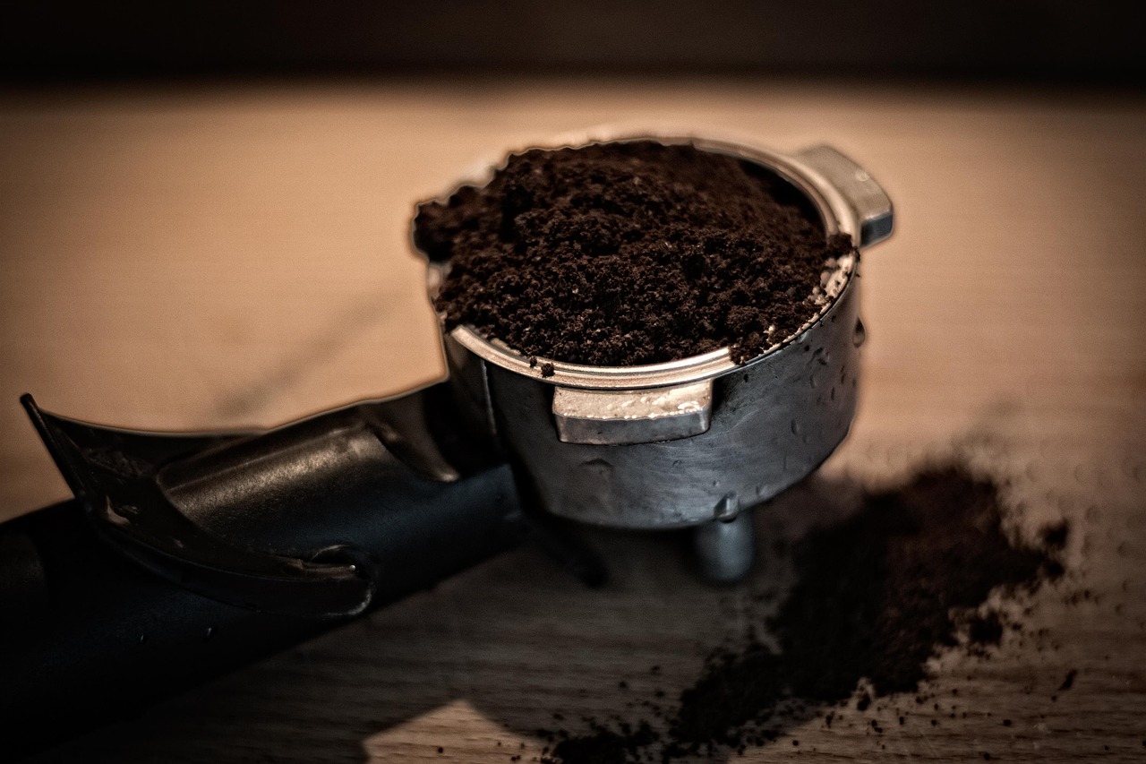 Well-organized home coffee bar setup with an espresso machine and grinder.