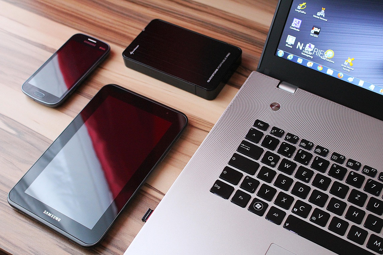 A home network planning interface next to a surveillance-grade hard drive.