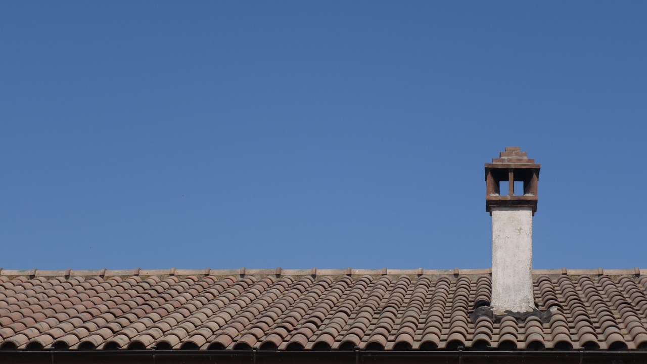 Close-up of weathered and curling asphalt shingles