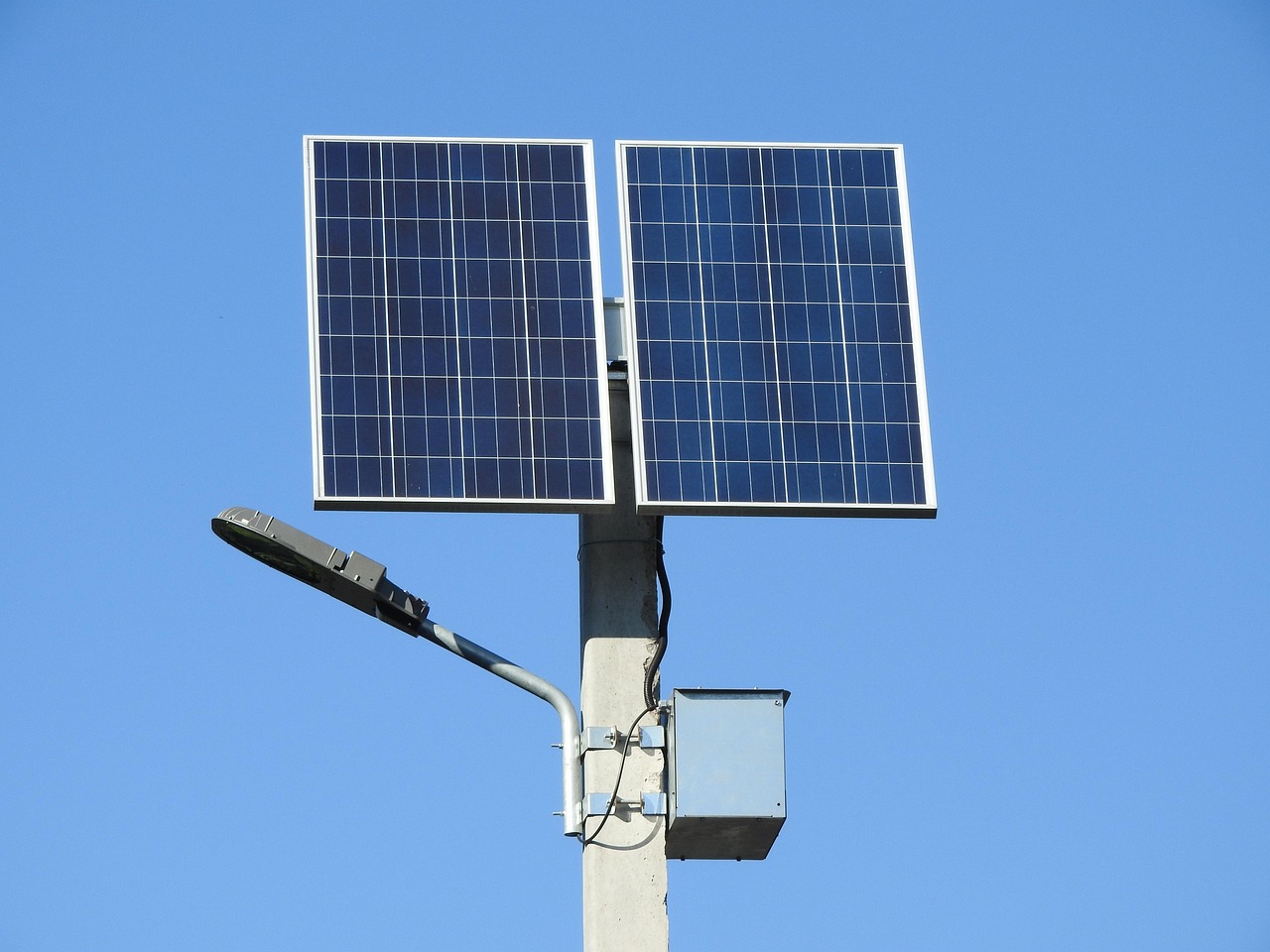 Wall-mounted residential battery storage system installed in a modern residential garage.