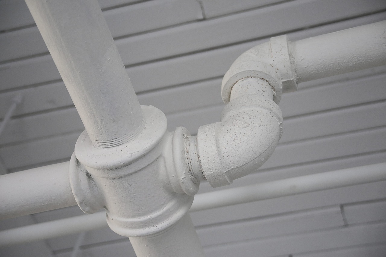 Exterior PVC sump pump discharge pipe
