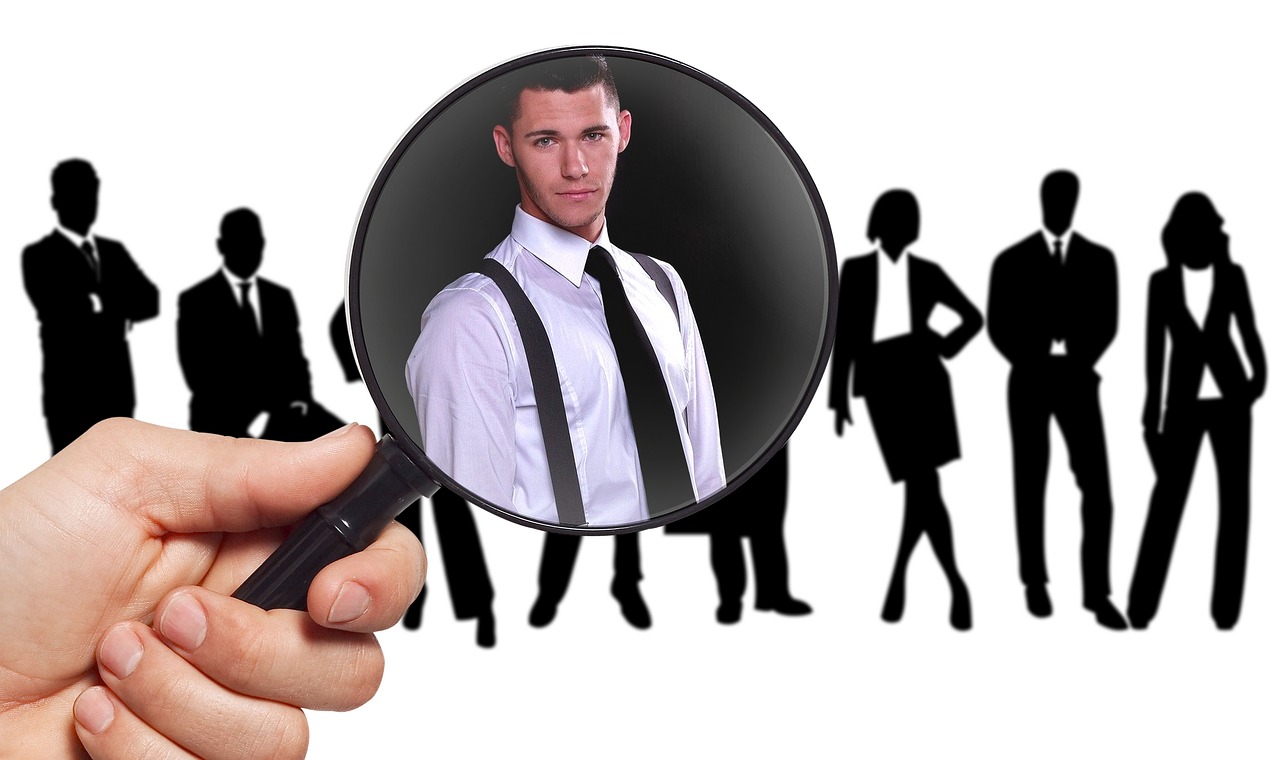 An employee discussing a jury summons with a corporate human resources representative.