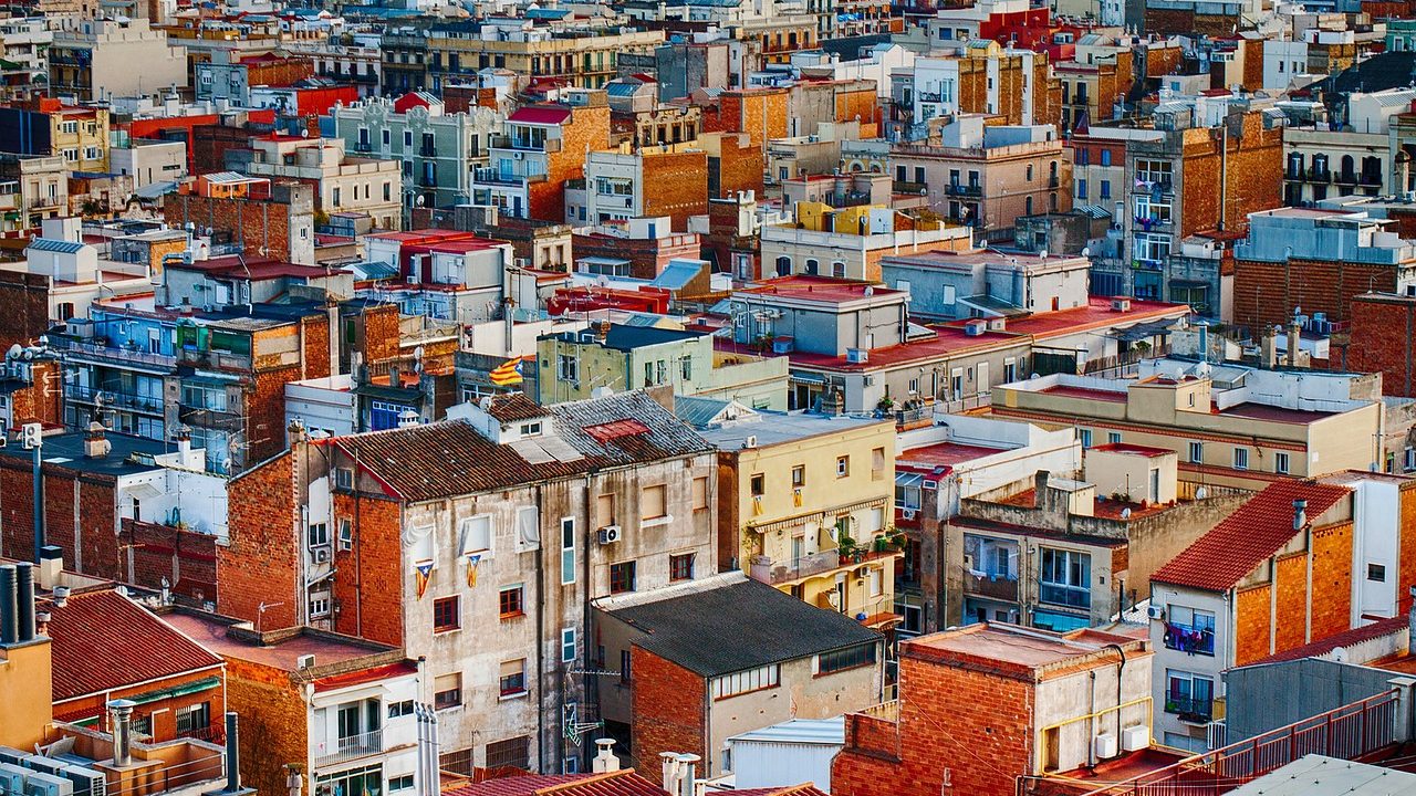 A modern installed whole-house dehumidifier unit connected to residential HVAC ductwork in a basement.