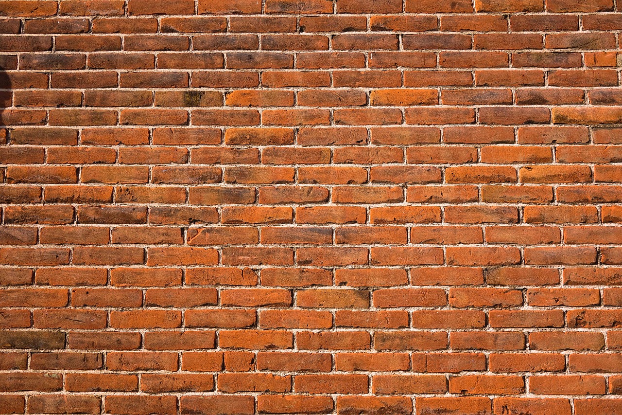 Basic tools used for clearing mortar and debris from brick weep holes.