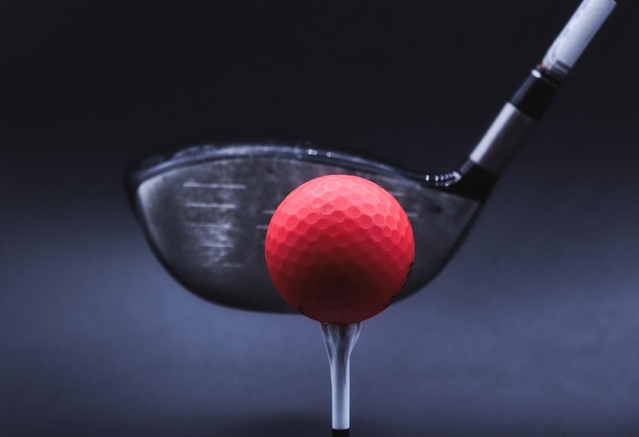 Workshop tool measuring the loft and lie angle of a golf iron.