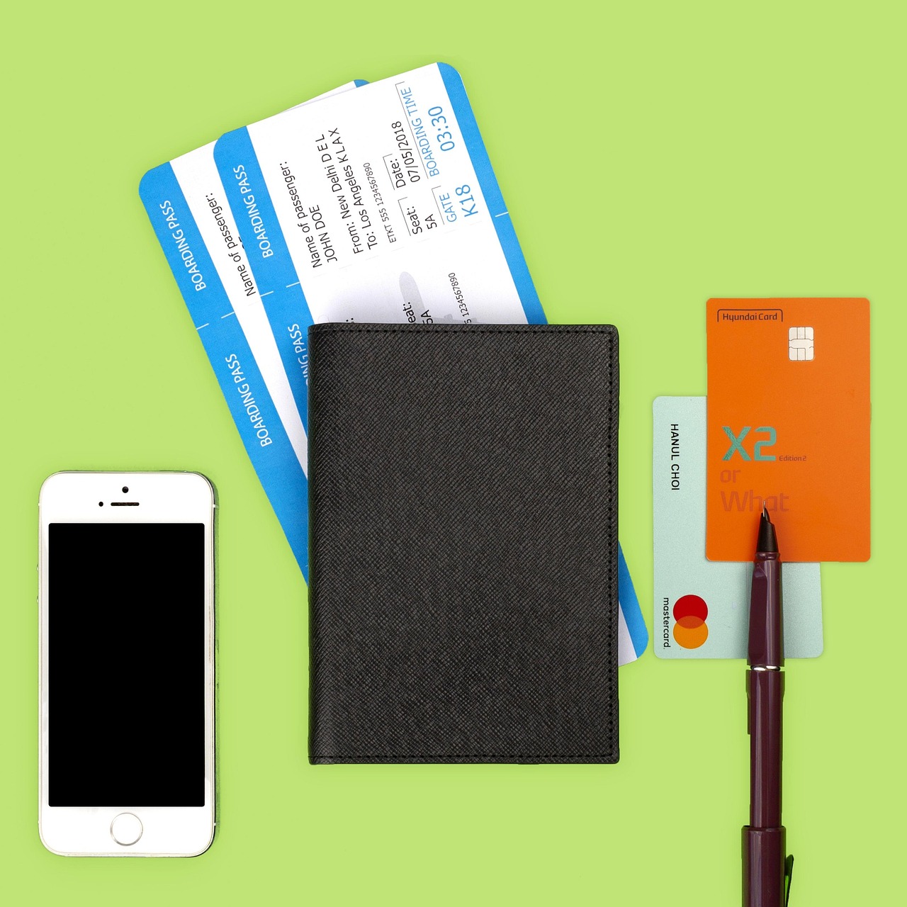 Traveler holding a US passport at an airport check-in counter