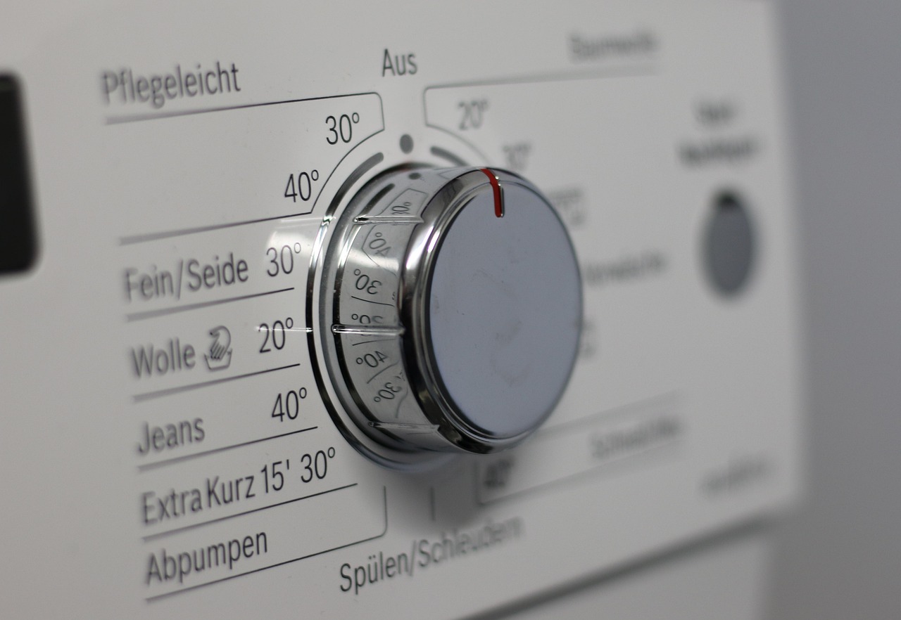 Close-up of a modern washing machine digital control panel