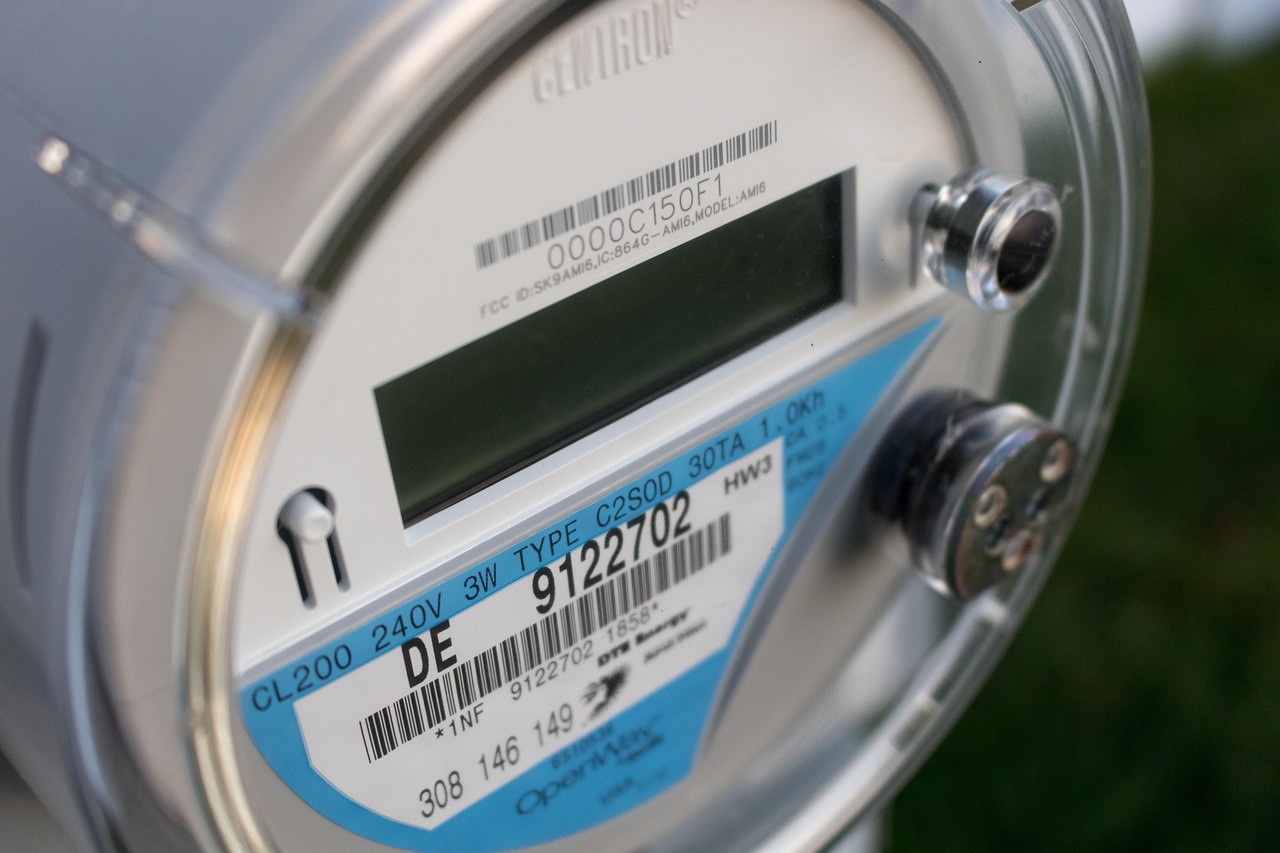 An exterior natural gas meter connected to a residential supply line.