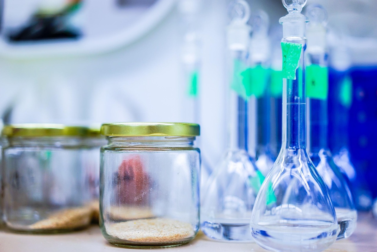 Various chemical and biological treatment bottles on a workbench