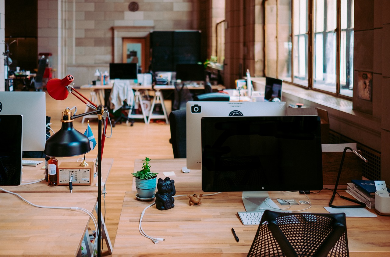 Empty modern office desk in a coworking facility