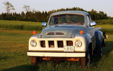 A clean pre-owned pickup truck parked on an outdoor dealership lot.