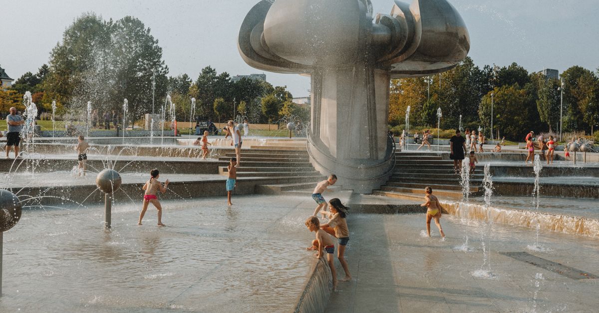 Children playing in a clean neighborhood pool facility