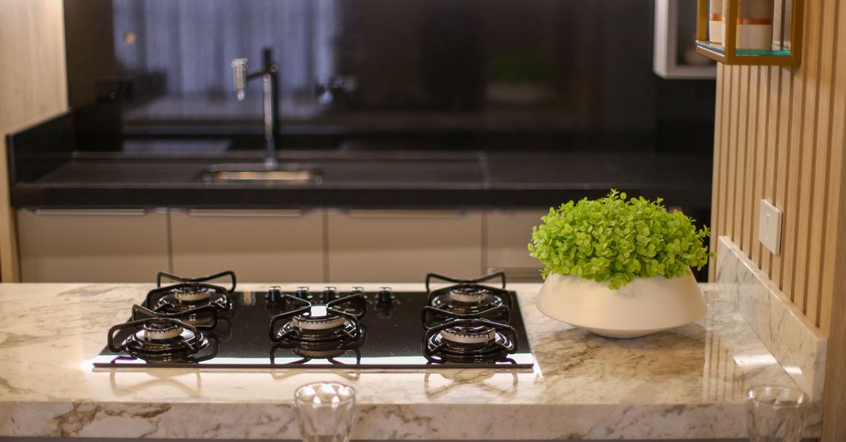 A sleek professional-style kitchen range installed in a modern home kitchen.