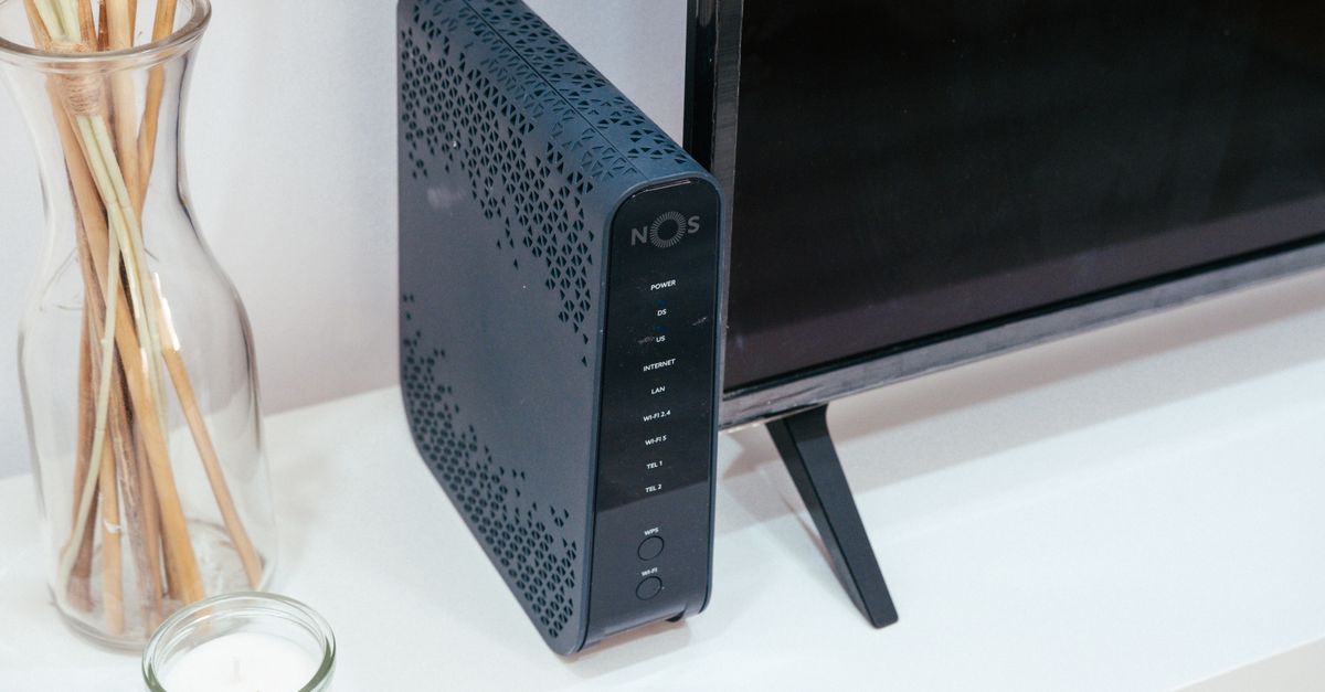 Cellular backup modem placed near a window for optimal signal reception.