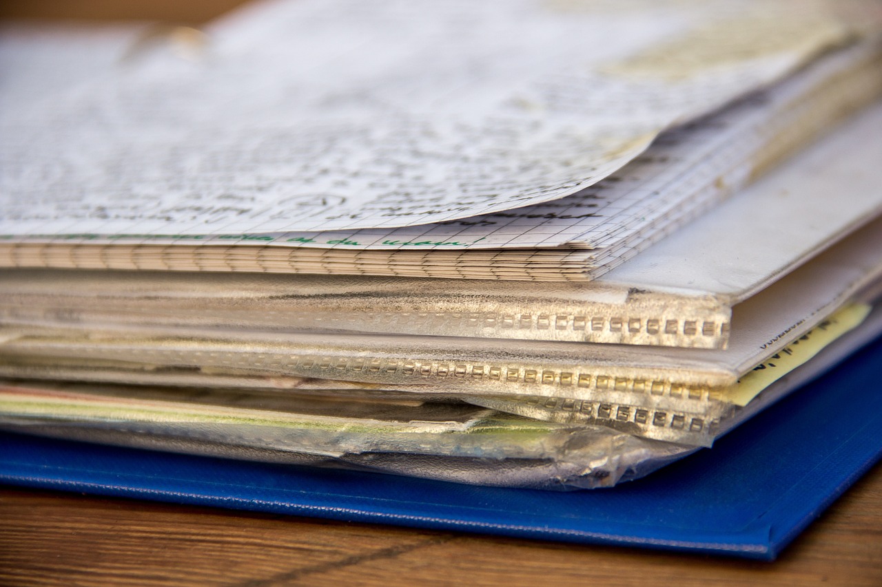 Open notebook showing structured project notes and task lists